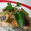 Мясо под овощами в духовке