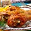 Апельсиновые куриные голени фаршированные чесноком