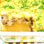 Картофельная запеканка с печенкой, тушеной в белом вине, и орехами