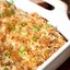 Запеченный картофель с луком, сыром и сметаной