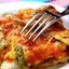 Курица под овощами в духовке