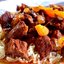 Мясо, тушенное с сухофруктами