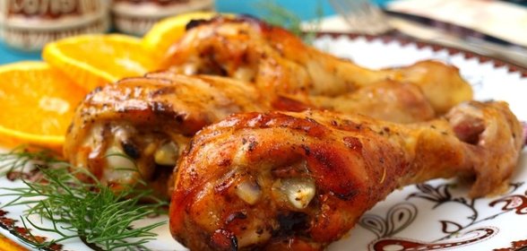 Апельсиновые куриные голени фаршированные чесноком