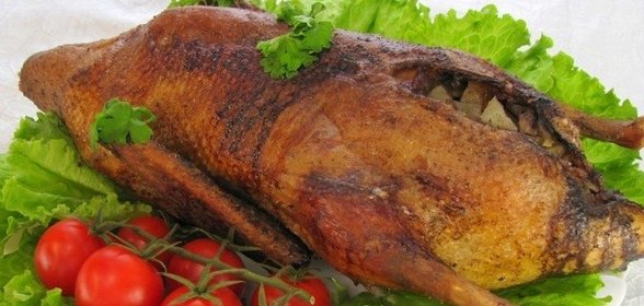 Утка, фаршированная грибами и картофелем