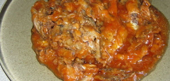 Квашеная капуста, тушенная с грибами и сметаной